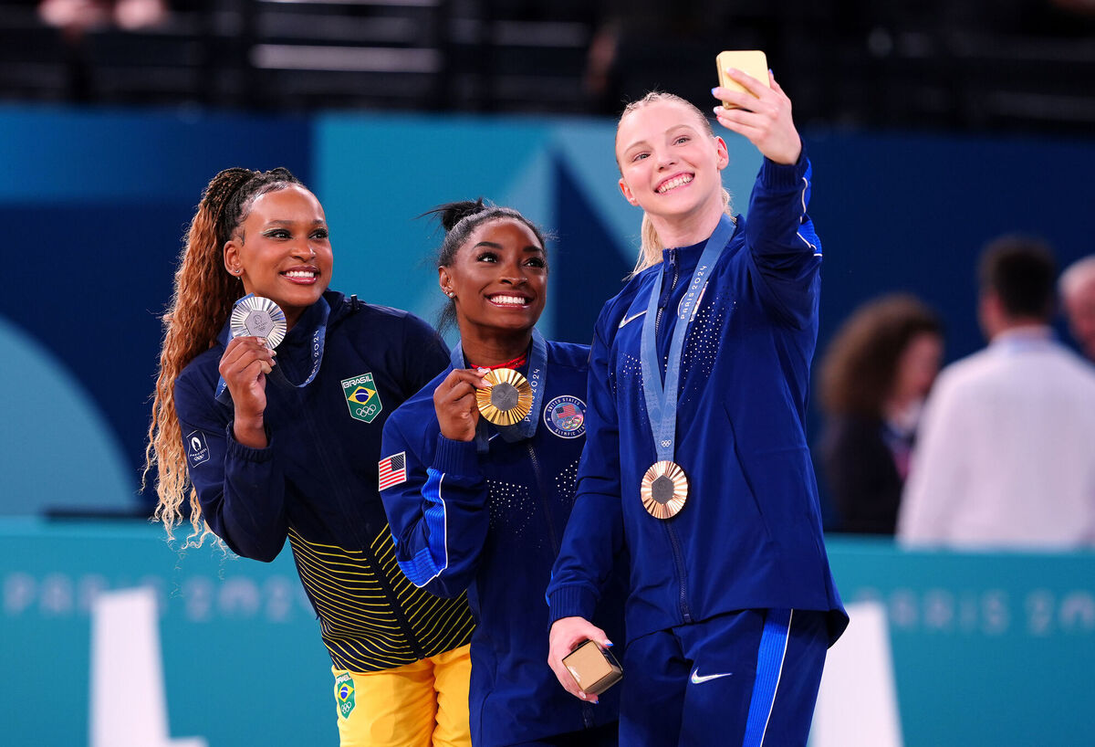 USA's Simone Biles (gold), Brazil's Rebeca Andrade (silver) and USA's Jade Carey (bronze) during the medal ceremony for the women's vault final on Saturday. Picture: Peter Byrne/PA Wire