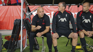 <p>Liverpool manager Arne Slot, left, sits with his coaching staff before an international friendly soccer match against Manchester United, Saturday, Aug. 3, 2024, in Columbia, S.C. (AP Photo/Artie Walker Jr.)</p>
