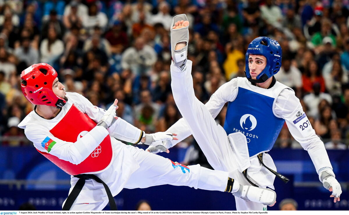 Jack Woolley of Team Ireland, right, in action against Gashim Magomedov of Team Azerbaijan. Photo by Stephen McCarthy/Sportsfile