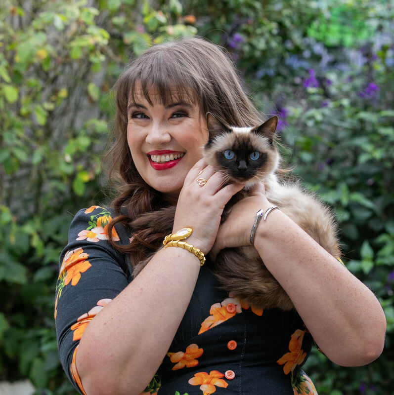 Sarah Rees Brennan with one of her cats.