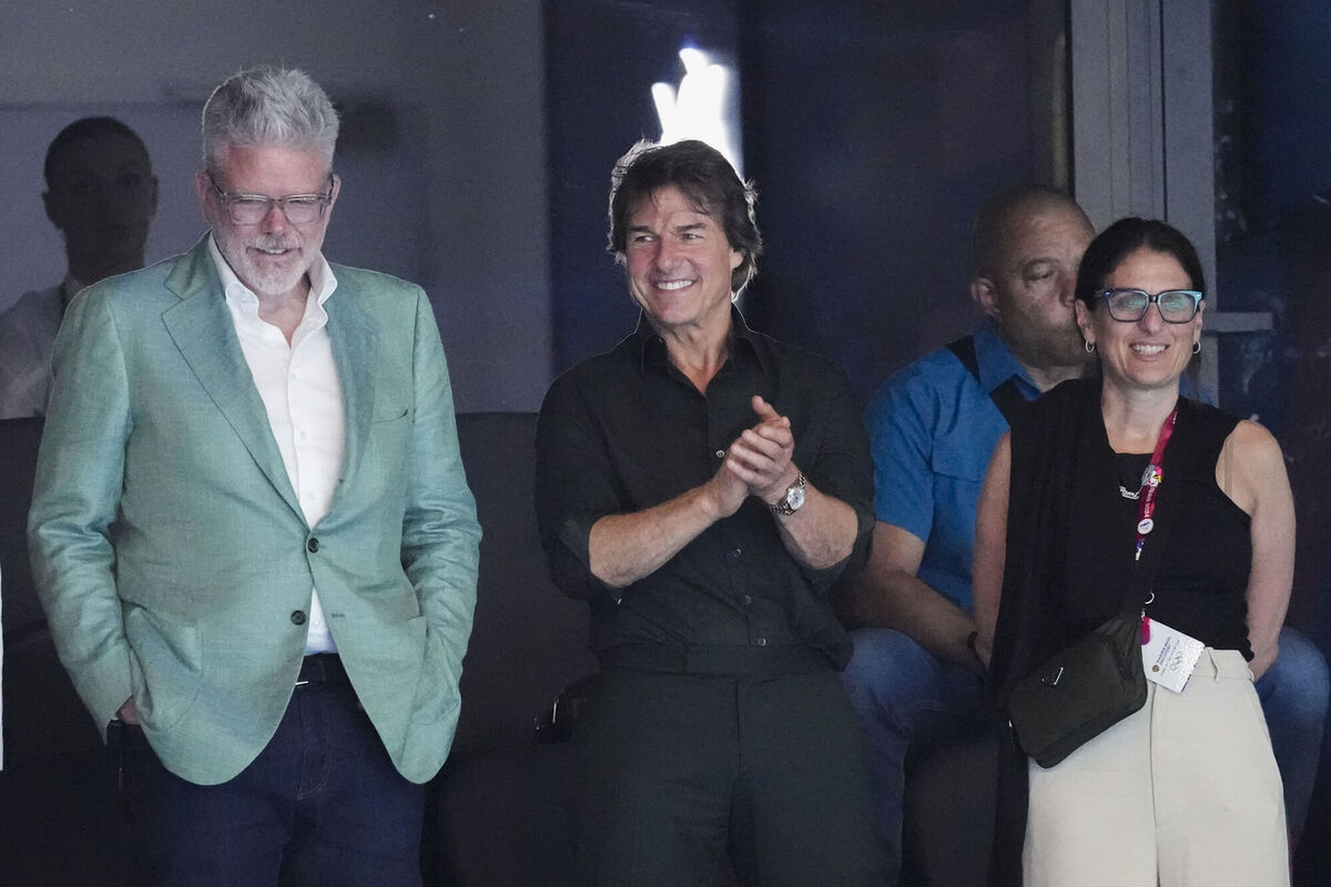 Tom Cruise and Director Christopher McQuarrie watch swimming during the 2024 Summer Olympics in Nanterre, France. Tom Cruise and Director Christopher McQuarrie watch swimming during the 2024 Summer Olympics in Nanterre, France.