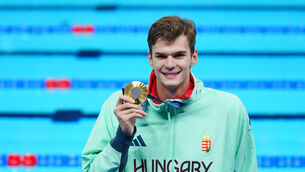 <p>Hungary’s Hubert Kos with his gold medal after winning in the men’s 200m backstroke final at the Paris La Defense Arena. Photo: Peter Byrne/PA Wire. </p>