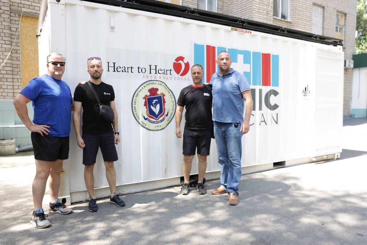 Ken Costello, One4Humanity; Vadim Vorovich, Cemark, a CRH company; and Miroslav Porochnavy and Shane Leahy both of One4Humanity in Kherson with one of the 16 mobile medical units the Irish group delivered to Ukraine. Ken Costello, One4Humanity; Vadim Vorovich, Cemark, a CRH company; and Miroslav Porochnavy and Shane Leahy both of One4Humanity in Kherson with one of the 16 mobile medical units the Irish group delivered to Ukraine.