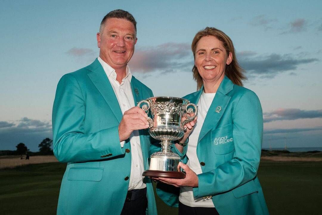 Ireland Men's captain Niall MacSweeney and Senior Women's captain Naoimh Quigg with the cup after the Irish team's win at the 2024 Home Internationals at Murcar Golf Club. Picture: Chris Young