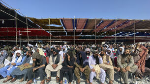 Afghan men attend a ceremony to celebrate the third anniversary of the withdrawal of US-led troops from Afghanistan (Siddiqullah Alizai/AP) Afghan men attend a ceremony to celebrate the third anniversary of the withdrawal of US-led troops from Afghanistan (Siddiqullah Alizai/AP)