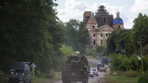 Military vehicles near the Russian-Ukrainian border (Evgeniy Maloletka/AP) Military vehicles near the Russian-Ukrainian border (Evgeniy Maloletka/AP)