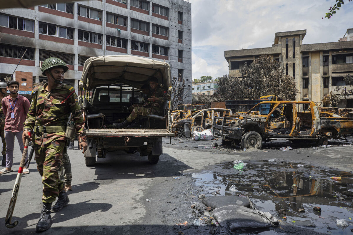 Army personnel keep guard in front of Jatrabari Police Station that was vandalized and set on fire, in Dhaka, Bangladesh on Friday. Hasina, who is Rahman’s daughter, stood out for her success at keeping the military (and Islamists) in check, at least until last week, when the army chief refused to continue supporting her crackdown on rampaging protesters. Photo: AP/Rajib Dhar Army personnel keep guard in front of Jatrabari Police Station that was vandalized and set on fire, in Dhaka, Bangladesh on Friday. Hasina, who is Rahman’s daughter, stood out for her success at keeping the military (and Islamists) in check, at least until last week, when the army chief refused to continue supporting her crackdown on rampaging protesters. Photo: AP/Rajib Dhar
