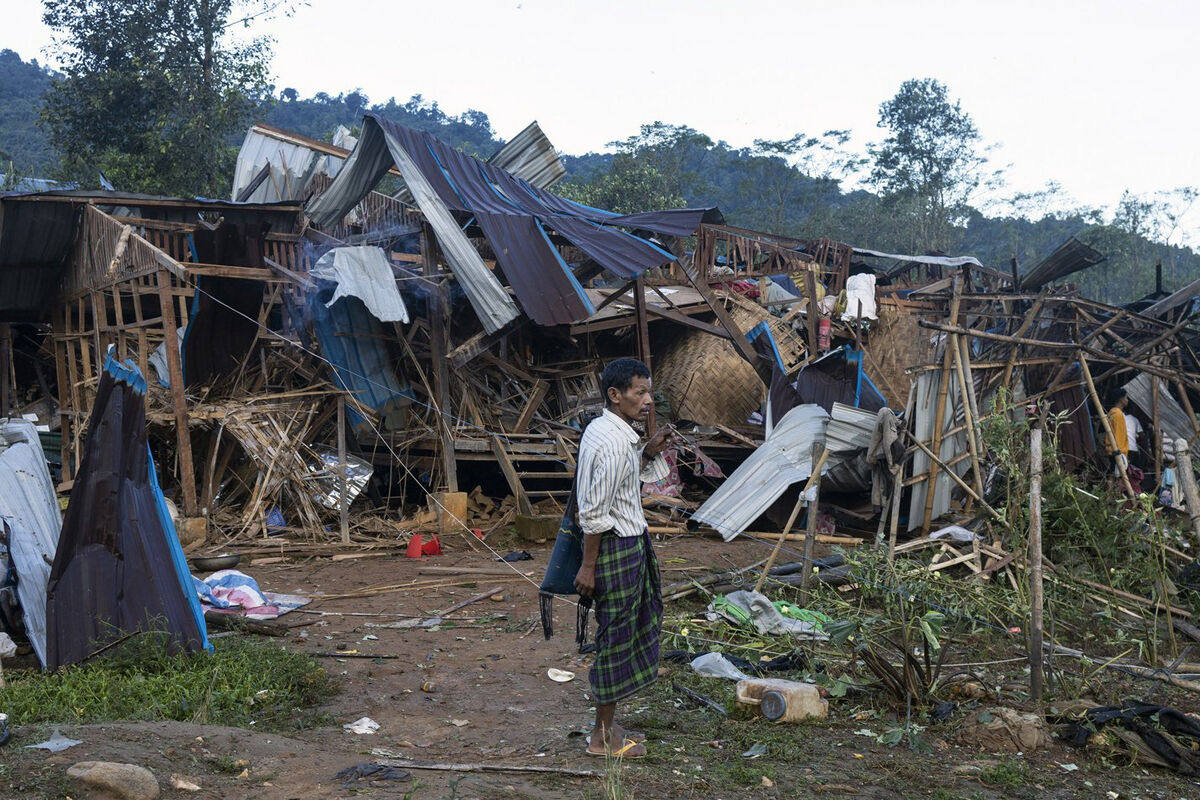 A man stands among destroyed homes after air and artillery strikes in Mung Lai Hkyet displacement camp, in Laiza, Myanmar, in October 2023. The military junta has stepped up punitive air strikes and artillery barrages in response to insurgents expanding their territorial control. File photo: AP A man stands among destroyed homes after air and artillery strikes in Mung Lai Hkyet displacement camp, in Laiza, Myanmar, in October 2023. The military junta has stepped up punitive air strikes and artillery barrages in response to insurgents expanding their territorial control. File photo: AP