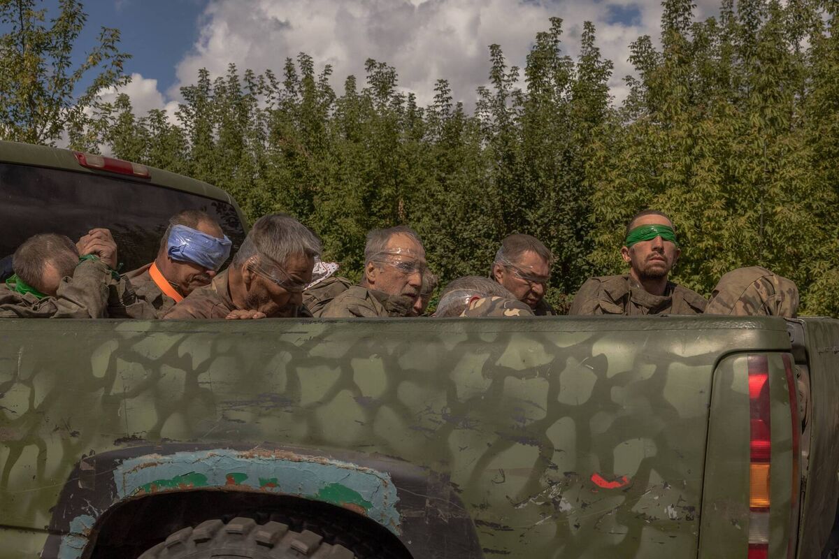 TOPSHOT - A Ukrainian military vehicle drives from the direction of the border with Russia carrying blindfolded men in Russian military uniforms, in the Sumy region, on August 13, 2024, amid the Russian invasion of Ukraine. Picture: ROMAN PILIPEY/AFP via Getty Images TOPSHOT - A Ukrainian military vehicle drives from the direction of the border with Russia carrying blindfolded men in Russian military uniforms, in the Sumy region, on August 13, 2024, amid the Russian invasion of Ukraine. Picture: ROMAN PILIPEY/AFP via Getty Images