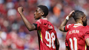 <p>Liverpool's Trey Nyoni celebrates scoring his side's fourth goal with teammate Virgil van Dijk during the pre-season friendly match against Sevilla. Pic: Richard Sellers/PA Wire.</p>