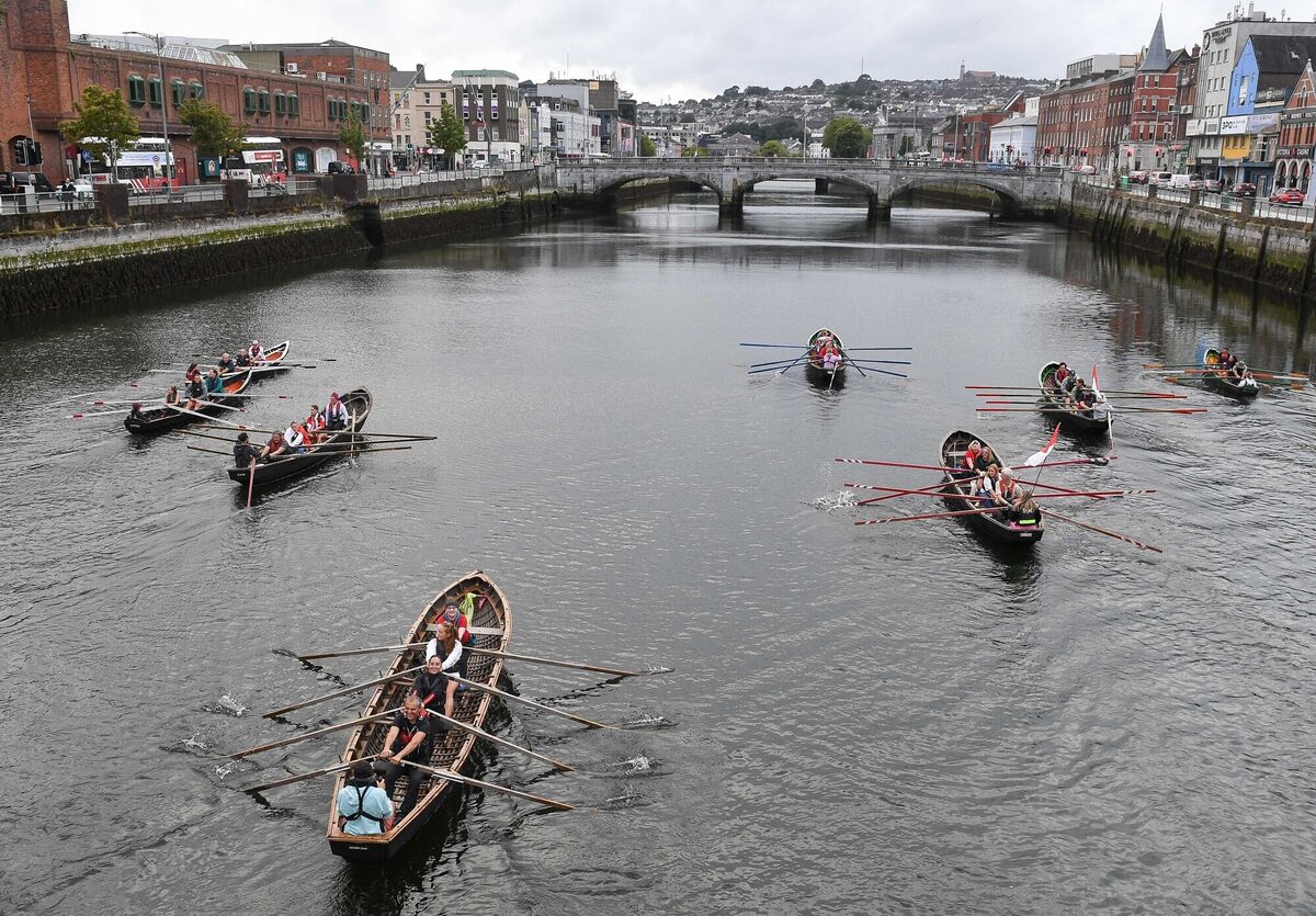  Members of the Cork victorious camogie teams in a flotilla of currachs on the River Lee. Picture: David Keane