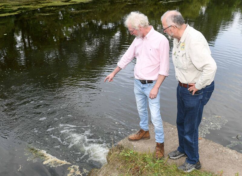Dinger Murphy and Denis Cronin, both members of the Macroom Trout Fly Anglers Association, at the outflow pipe of the Uisce Eireann waste water treatment plant at the Sullane River in Macroom, Co Cork. Picture: David Keane Dinger Murphy and Denis Cronin, both members of the Macroom Trout Fly Anglers Association, at the outflow pipe of the Uisce Eireann waste water treatment plant at the Sullane River in Macroom, Co Cork. Picture: David Keane