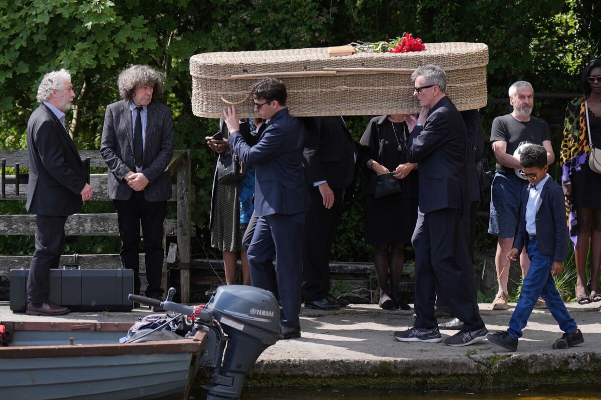 Actor Stephen Rea looks on as the coffin of Edna O'Brien is brought to Holy Island. Picture: PA