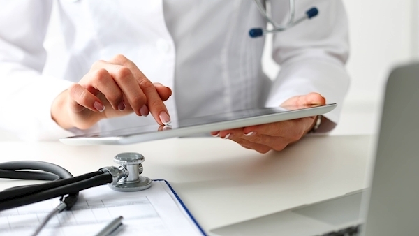 Doctors using online forms and apps to consult with patients