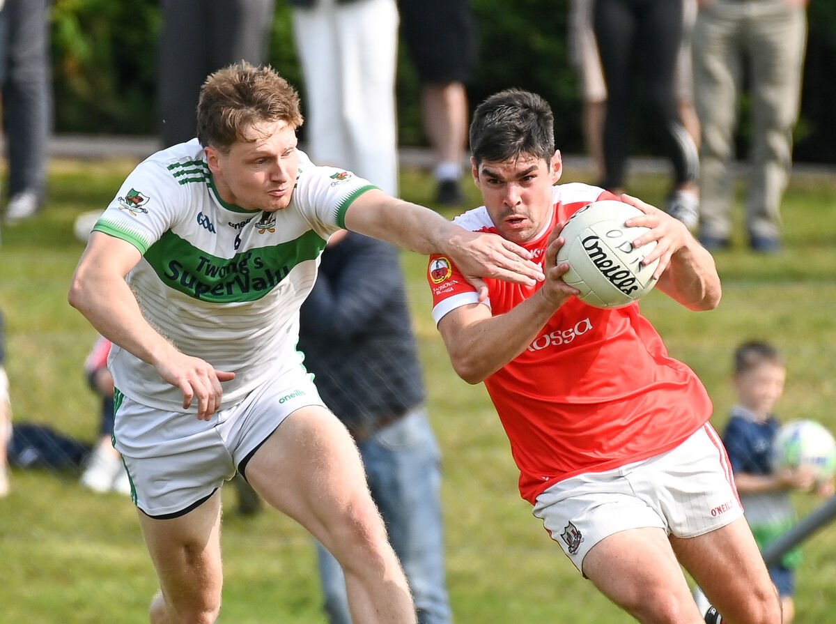  O'Donovan Rossa's Kevin Davis tries to get away from Kanturk's Ryan Walsh, during their Senior AFC clash in Kilmichael. Picture: David Keane.