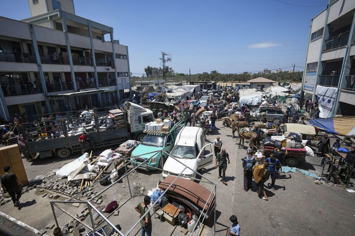 Palestinians evacuate a school that had been their shelter, in eastern Deir al-Balah, Gaza Strip. Picture: AP Photo/Abdel Kareem Hana Palestinians evacuate a school that had been their shelter, in eastern Deir al-Balah, Gaza Strip. Picture: AP Photo/Abdel Kareem Hana