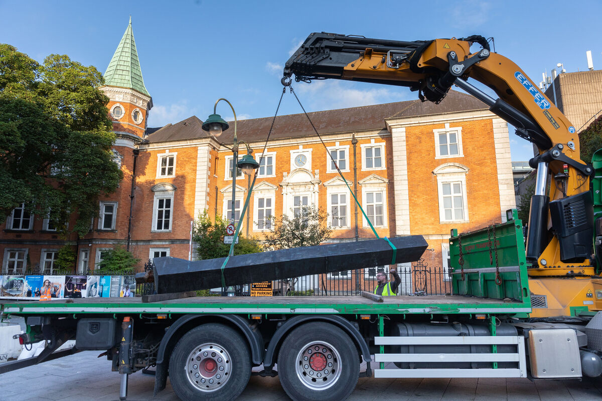 Obelisk of Bronze by Michael Warren, the tallest sculpture in Crawford Art Gallery’s collection, being removed on Tuesday. Picture: Darragh Kane
