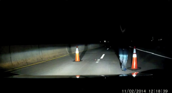 This dashcam video of a suspicious roadblock is very creepy