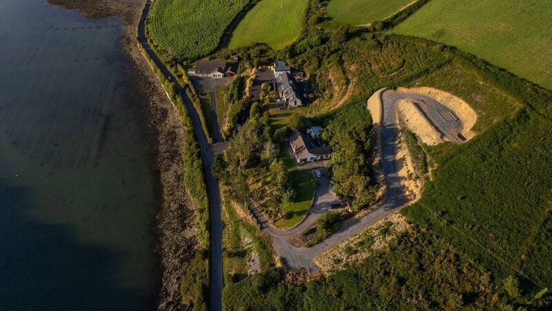 Expansive views of Oysterhaven's coast for €725,000