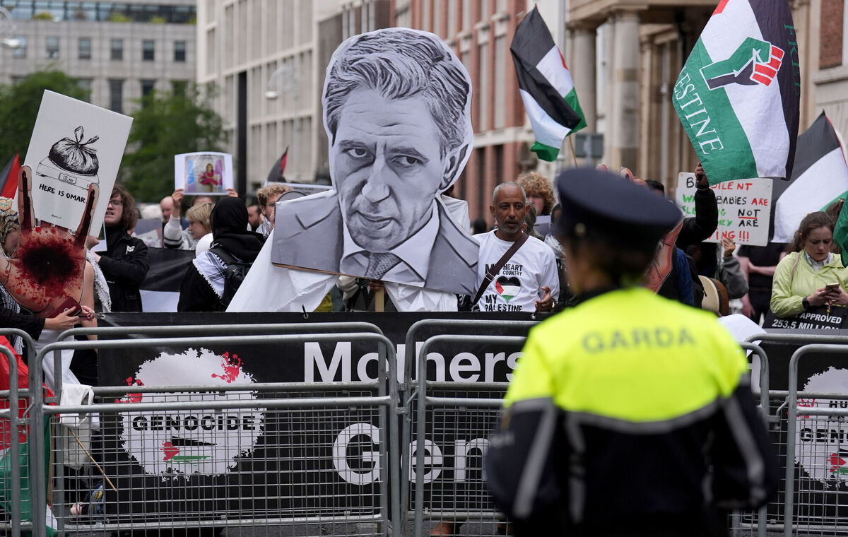 Pro-Palestine protesters demonstrate outside Leinster House. Picture: Brian Lawless/PA Wire Pro-Palestine protesters demonstrate outside Leinster House. Picture: Brian Lawless/PA Wire