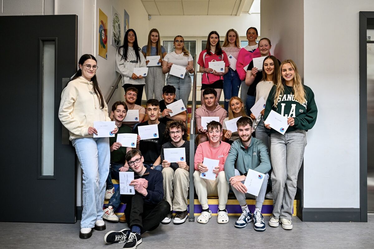 Gaelcholáiste Carrigaline students from the class of 2024 meet at the school to celebrate after receiving their Leaving Cert results on Friday. Picture Chani Anderson