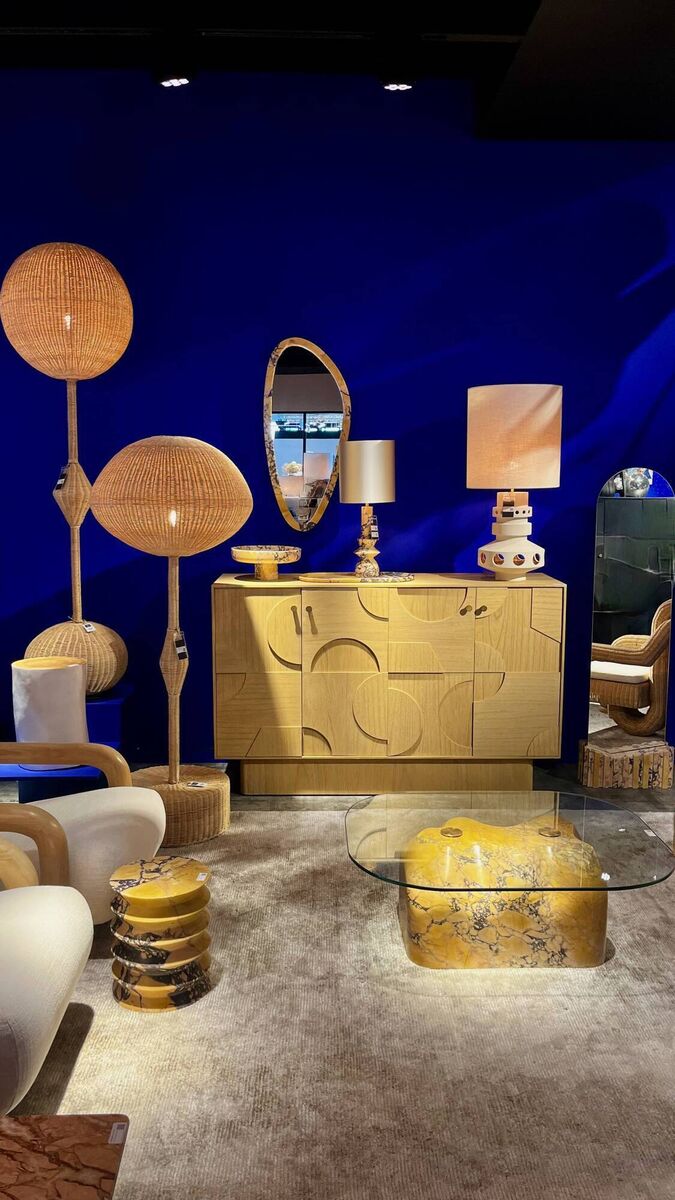 A clever statement wall with cobalt blue paint against neutral furniture by Versmissen at Maison et Object September 2023.