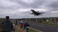 Close shave with fighter jet causes spectators to scramble