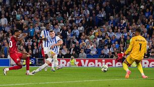 <p>OFF THE MARK: Brighton's Mark O'Mahony scores his team's fourth goal. Pic: GLYN KIRK/AFP via Getty Images.</p>