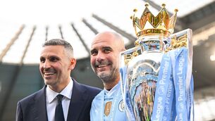 <p>Khaldoon Al Mubarak, Chairman of Manchester City, and Pep Guardiola with the Premier League trophy</p>