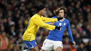 <p>BURNLEY BOUND: Former Brazil star Ronaldinho (left) has seen his son link up with Burnley. Picture: Sean Dempsey/PA</p>