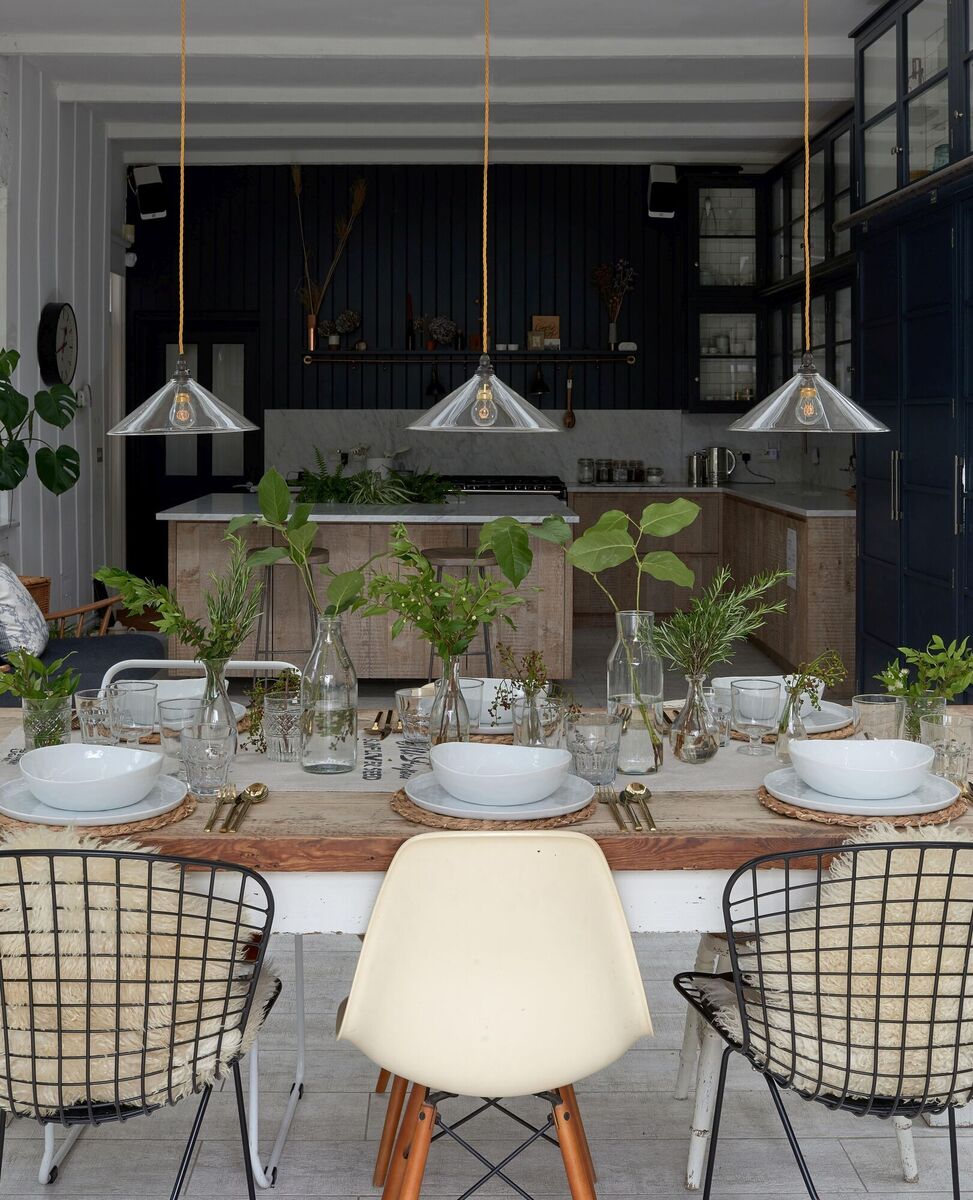  Lovely light fittings finish off a dining room, Hay pendant; €330 each, Fritz Fryer. 