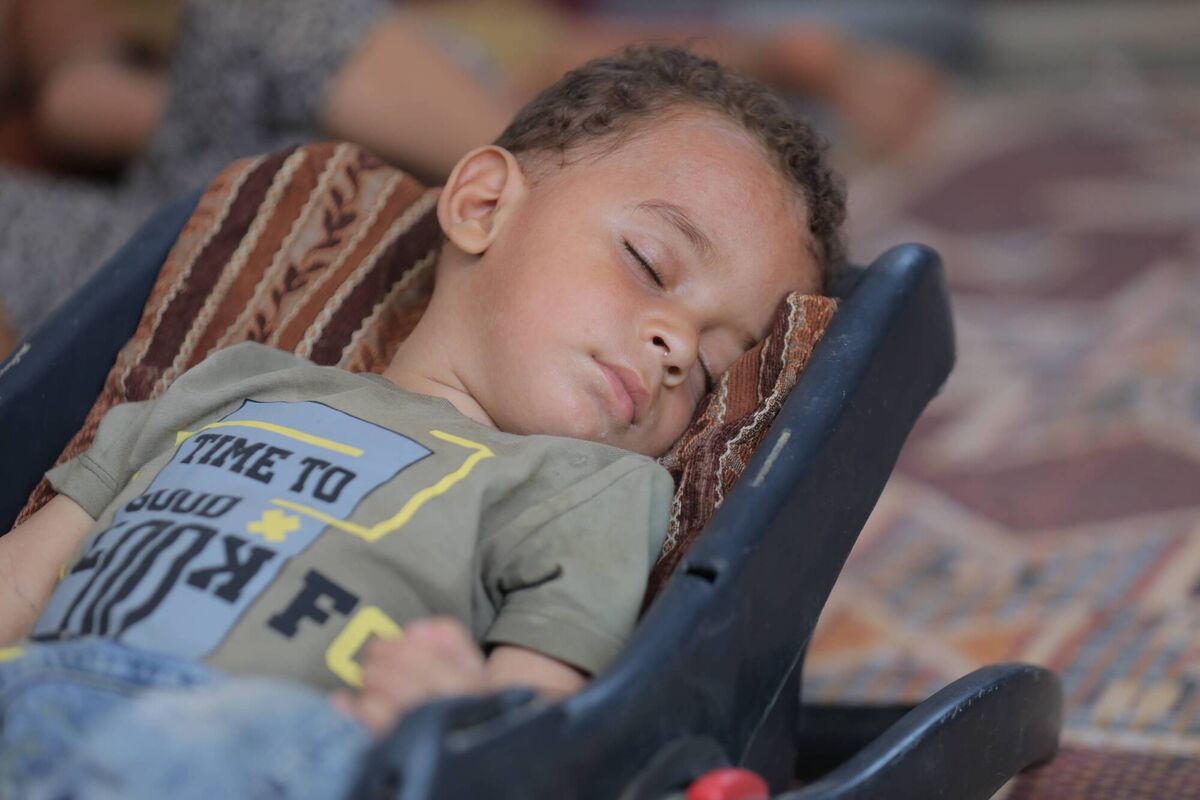 Abdul Rahman Abu al-Jidyen, who is suffering from polio, sleeps on his carrycot in Deir Al Balah, Gaza. Picture: Hassan Jedi/Anadolu/Getty