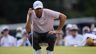 <p>Scottie Scheffler lines up his putt on the seventh green during the second round of the Tour Championship at East Lake. Picture: AP Photo/Mike Stewart</p>