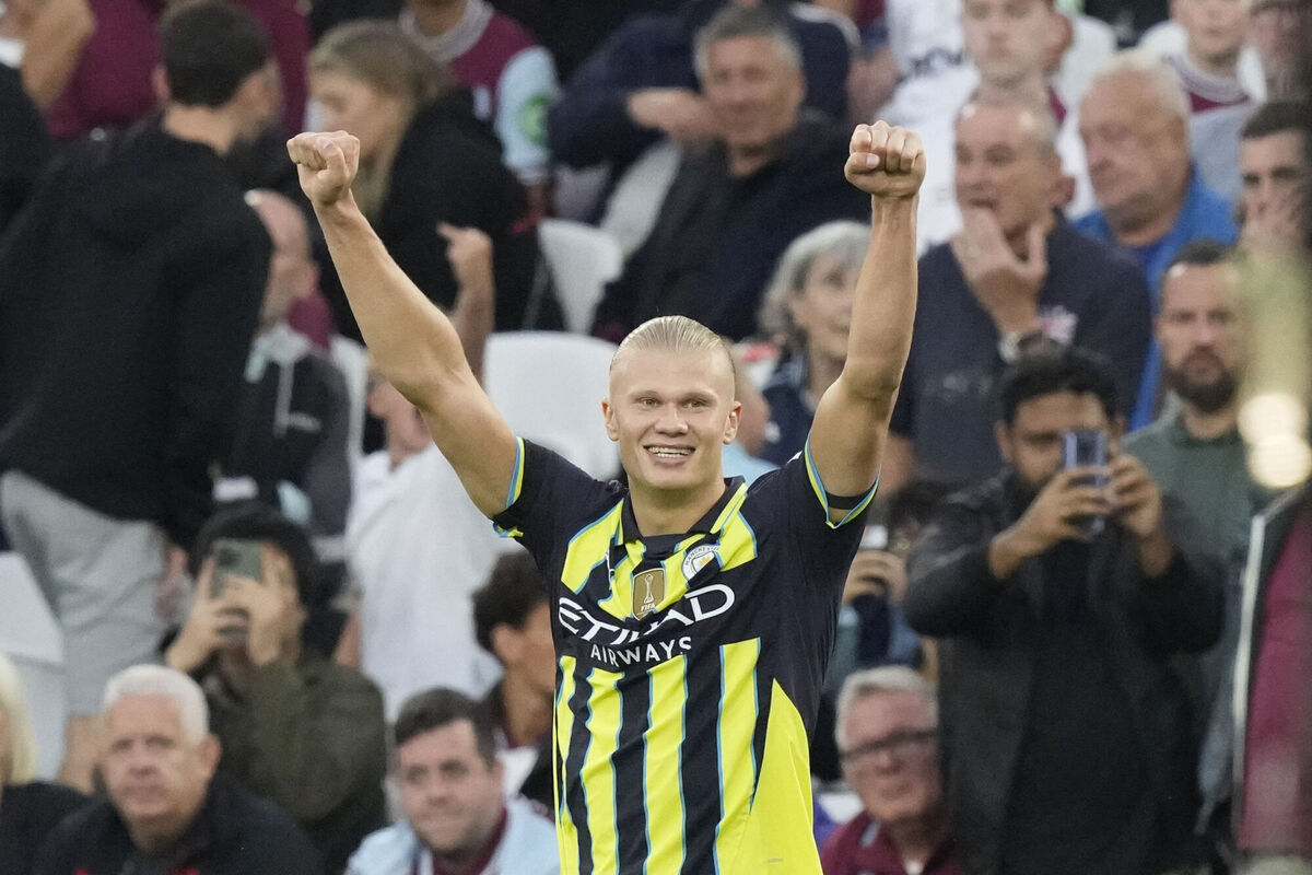 Manchester City's Erling Haaland celebrates after scoring his side's third goal during the English Premier League soccer match between West Ham United and Manchester City at the London Stadium in London, England, Saturday, Aug. 31, 2024. (AP Photo/Frank Augstein)