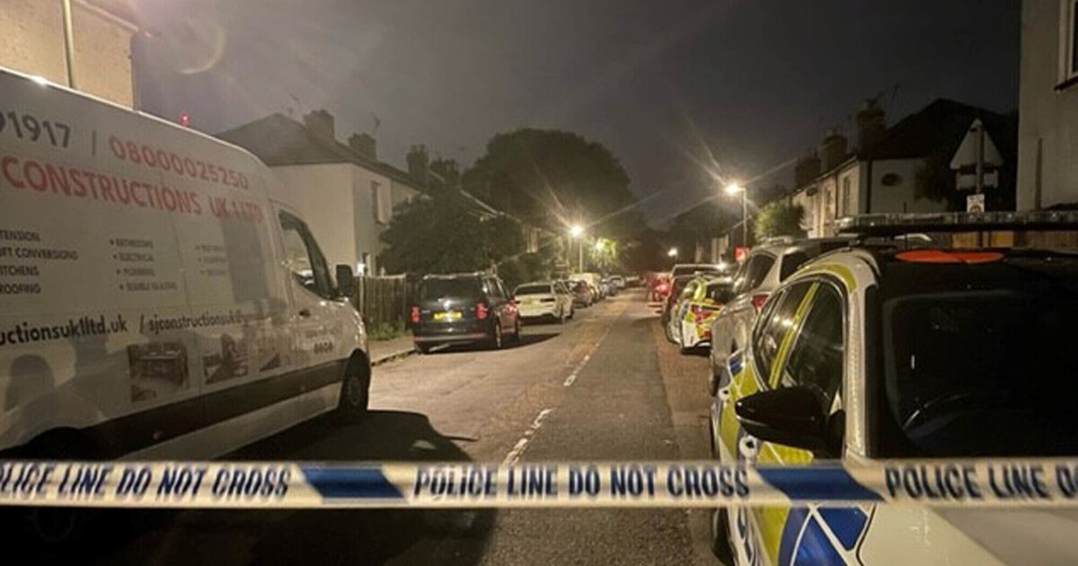Three children and man found dead in Surrey house
