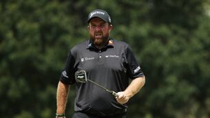 <p>Shane Lowry of Ireland reacts to his par on the fourth green during the final round of the TOUR Championship at East Lake Golf Club on September 01, 2024 in Atlanta, Georgia. (Photo by Mike Mulholland/Getty Images)</p>