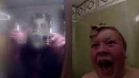 Dad scares the life out of his son in shower prank