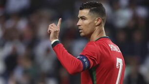 <p>EYES ON MORE PRIZES: Portugal's Cristiano Ronaldo reacts during a friendly soccer match between Portugal and Ireland. Pic: AP Photo/Luis Vieira.</p>