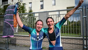 <p>Linda Kelly and Katie-George Dunlevy celebrate winning gold. Picture: Ramsey Cardy/Sportsfile</p>