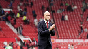 <p>Manchester United manager Erik ten Hag applauds the fans at Old Trafford on Sunday. </p>