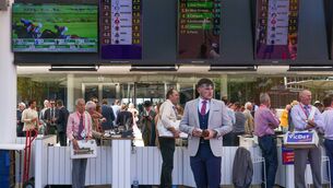 <p>Bookmakers wait for customers in the betting ring during Melbourne Cup Day. Pic: Asanka Ratnayake/Getty Images</p>