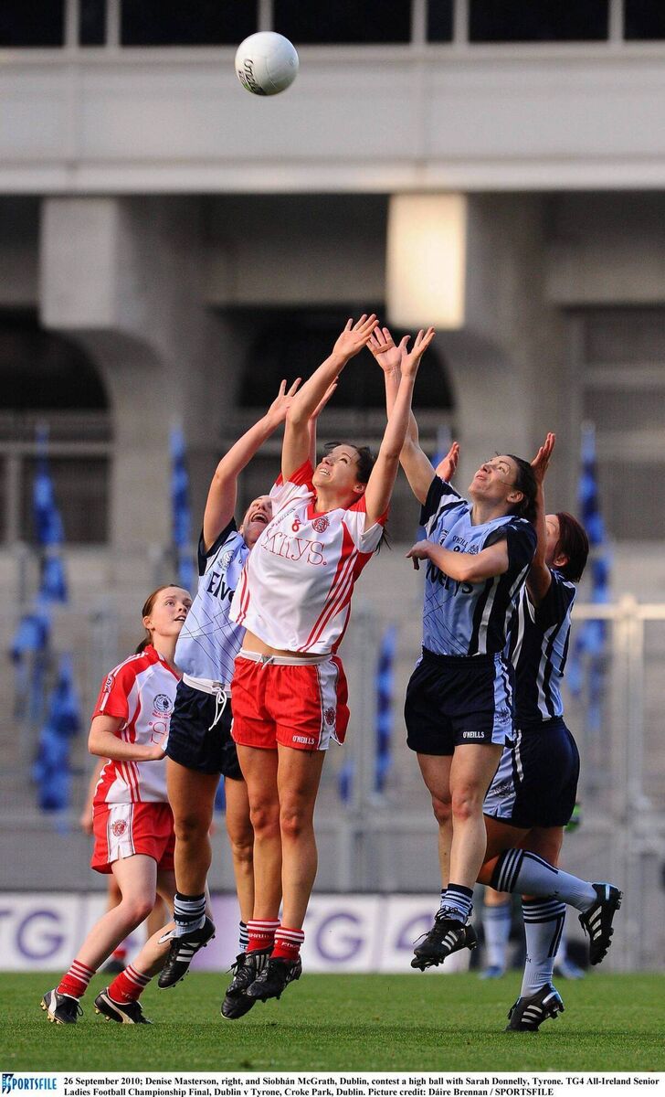 Denise Masterson, right, and Siobhán McGrath, Dublin, contest a high ball with Sarah Donnelly, Tyrone, at the TG4 All-Ireland Senior Ladies Football Championship Final 2010.