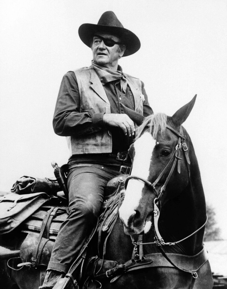 'Did you know,' one Hollywood bigwig then states, 'that John Wayne himself owned one of the largest cattle ranches in the US?'