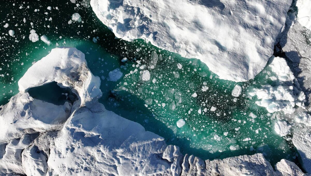 Melting icebergs lie in the Ilulissat Icefjord near the mouth to Disko Bay, in western Greenland. The Ilulissat Icefjord is approximately 60km long and is a conduit for icebergs calving from the massive Sermeq Kujalleq glacier of the Greenland ice sheet. Picture: Sean Gallup/Getty Melting icebergs lie in the Ilulissat Icefjord near the mouth to Disko Bay, in western Greenland. The Ilulissat Icefjord is approximately 60km long and is a conduit for icebergs calving from the massive Sermeq Kujalleq glacier of the Greenland ice sheet. Picture: Sean Gallup/Getty
