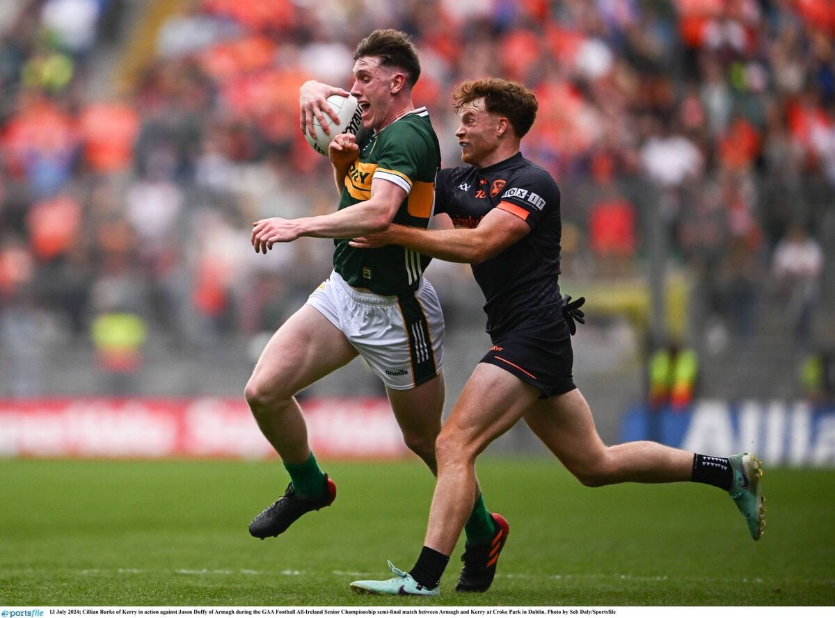 SHINING LIGHT: Cillian Burke of Kerry in action against Jason Duffy of Armagh. Photo by Seb Daly/Sportsfile