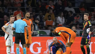 Nathan Ake was injured against Germany (Peter Dejong/AP)