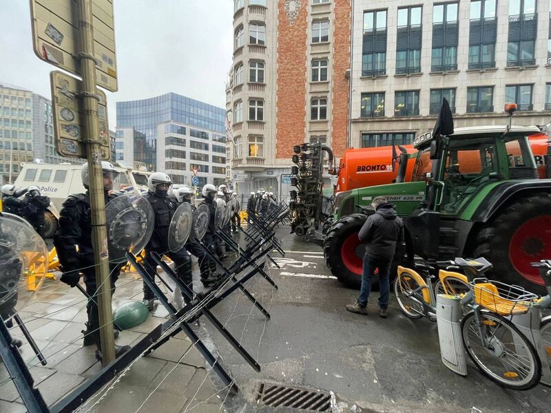 Farmers protest at the EU headquarters in Brussels in February. Farmers protest at the EU headquarters in Brussels in February.