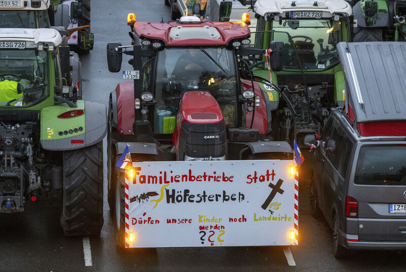 German farmers protest in Berlin in January against a plan to scrap tax breaks on the diesel they use. Picture: Monika Skolimowska/dpa via AP German farmers protest in Berlin in January against a plan to scrap tax breaks on the diesel they use. Picture: Monika Skolimowska/dpa via AP