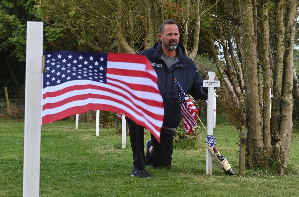 Former Seattle, Washington firefighter Tony Lenseigne at one of the memorials for Lt Kevin Donnelly of Ladder 3 FDNY. Tony left a bottle of whiskey in tribute to his fallen comrade. Picture: Dan Linehan