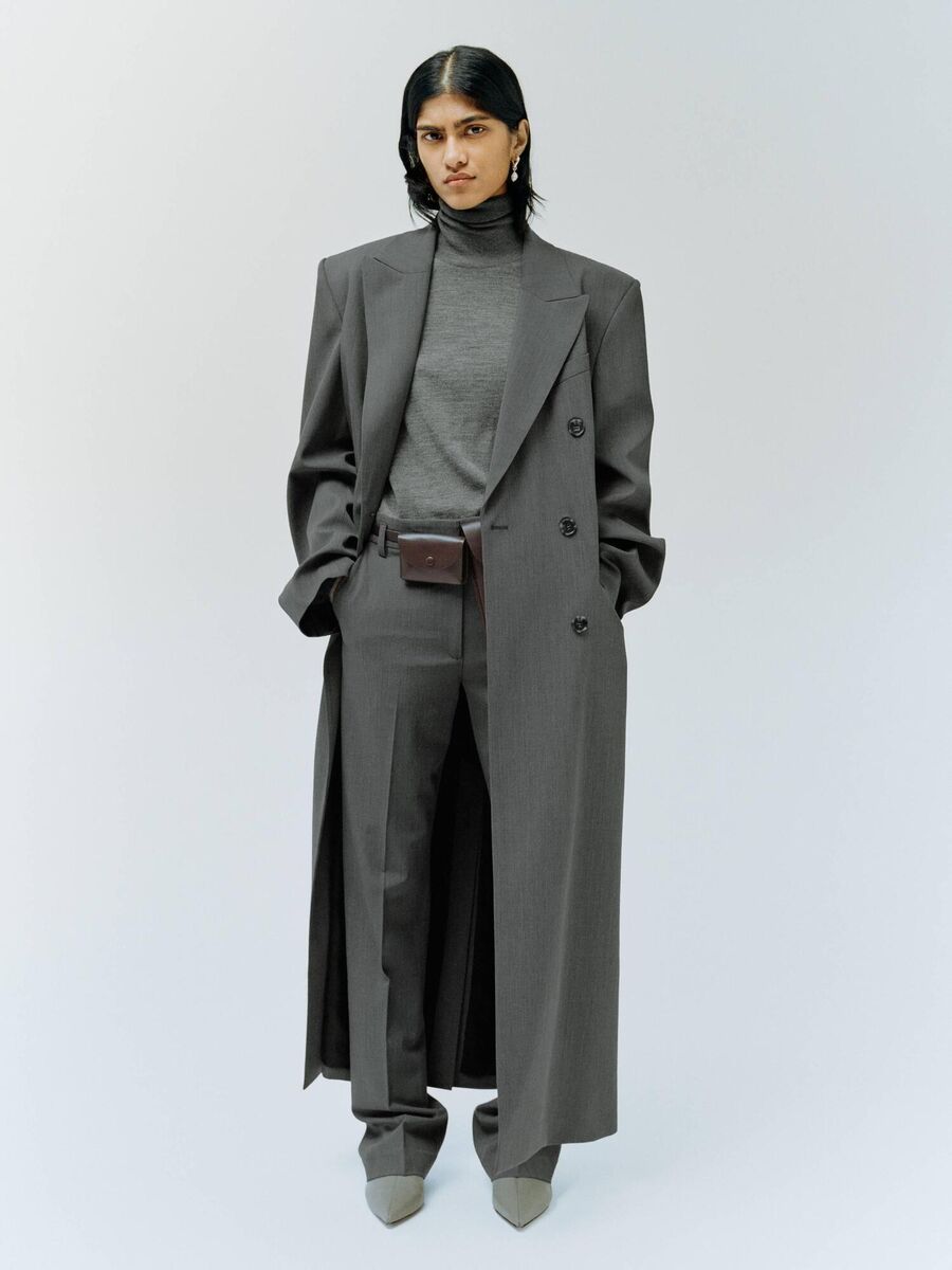 Oversized double-breasted coat, €279; roll-neck wool top, €49; tailored wool-blend trousers, €119, Arket